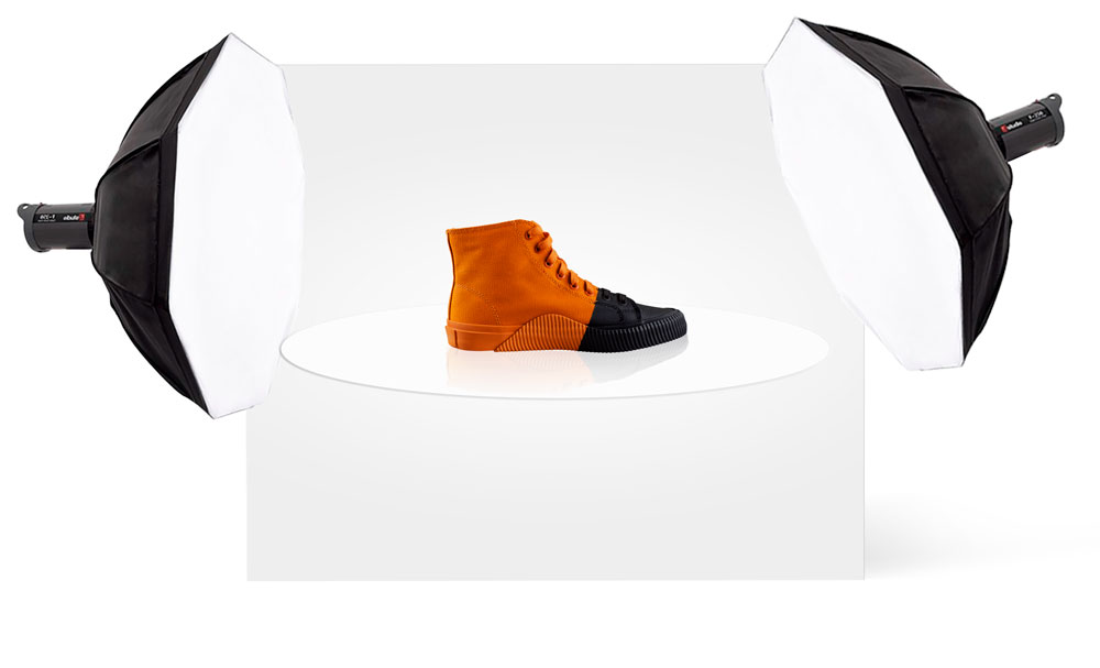 Photo of shoe with studio lights on both sides.